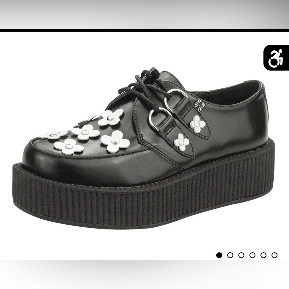 Tuks footwear black platform shoes with flower accents